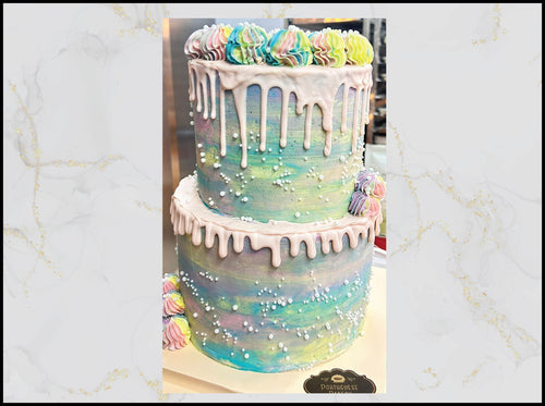 Multicolored drip cake with floral decorations macau bakery cake