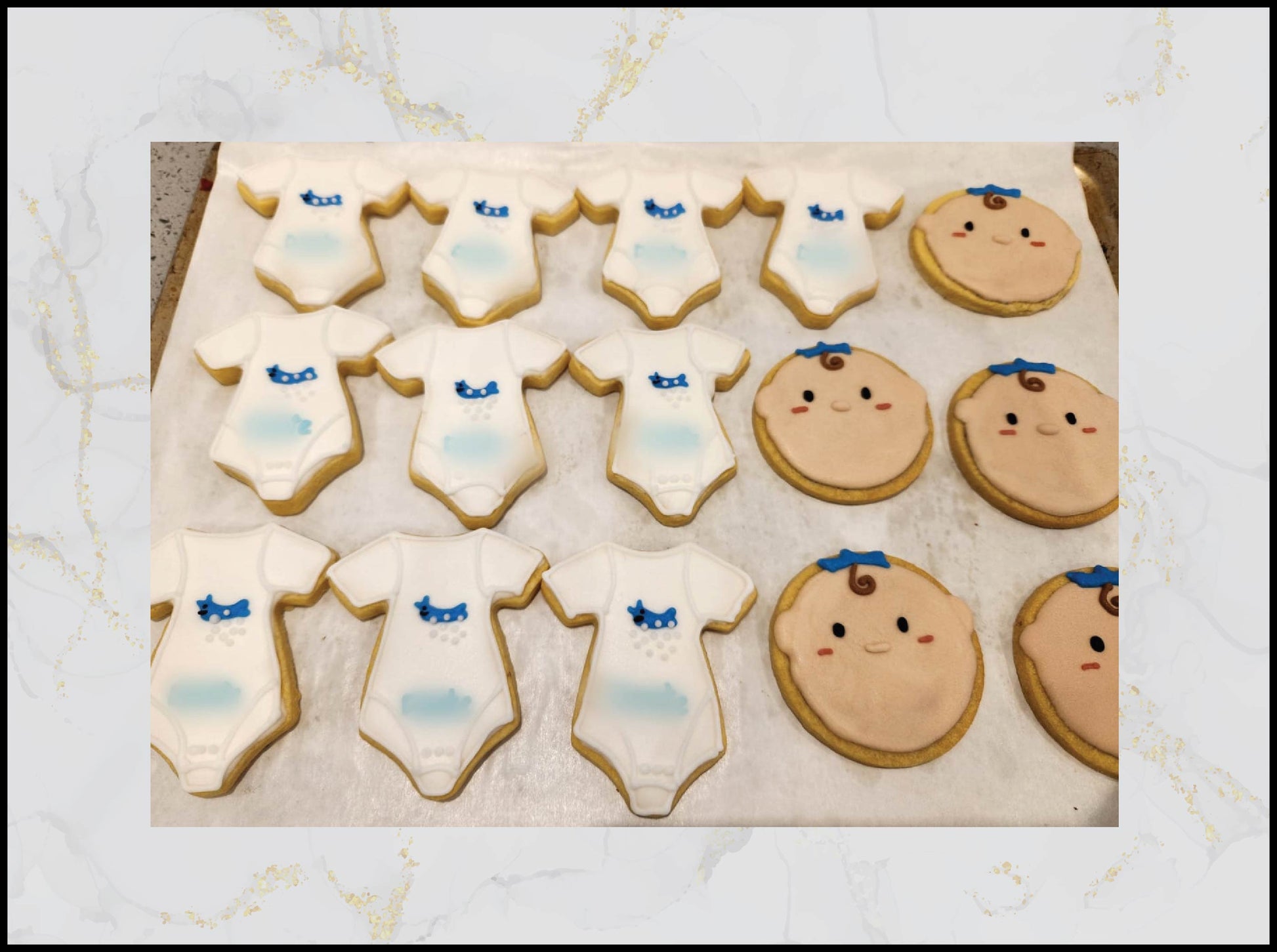 Baby shower decorated cookies with pastel bow and baby theme in Macau