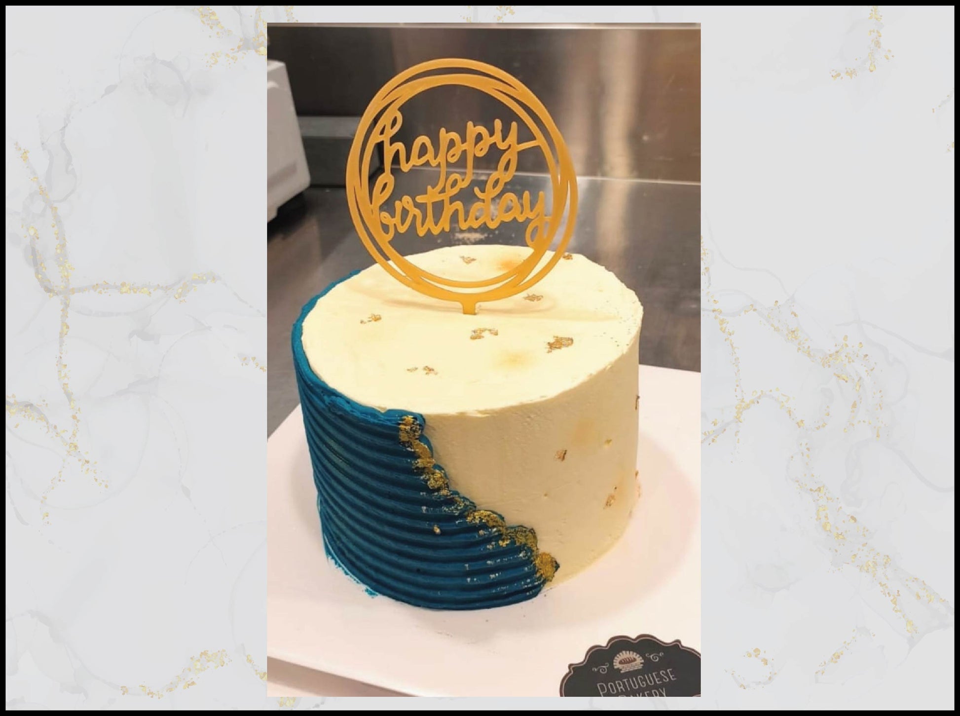 :
Blue, gold and white birthday cake with elegant design in Macau