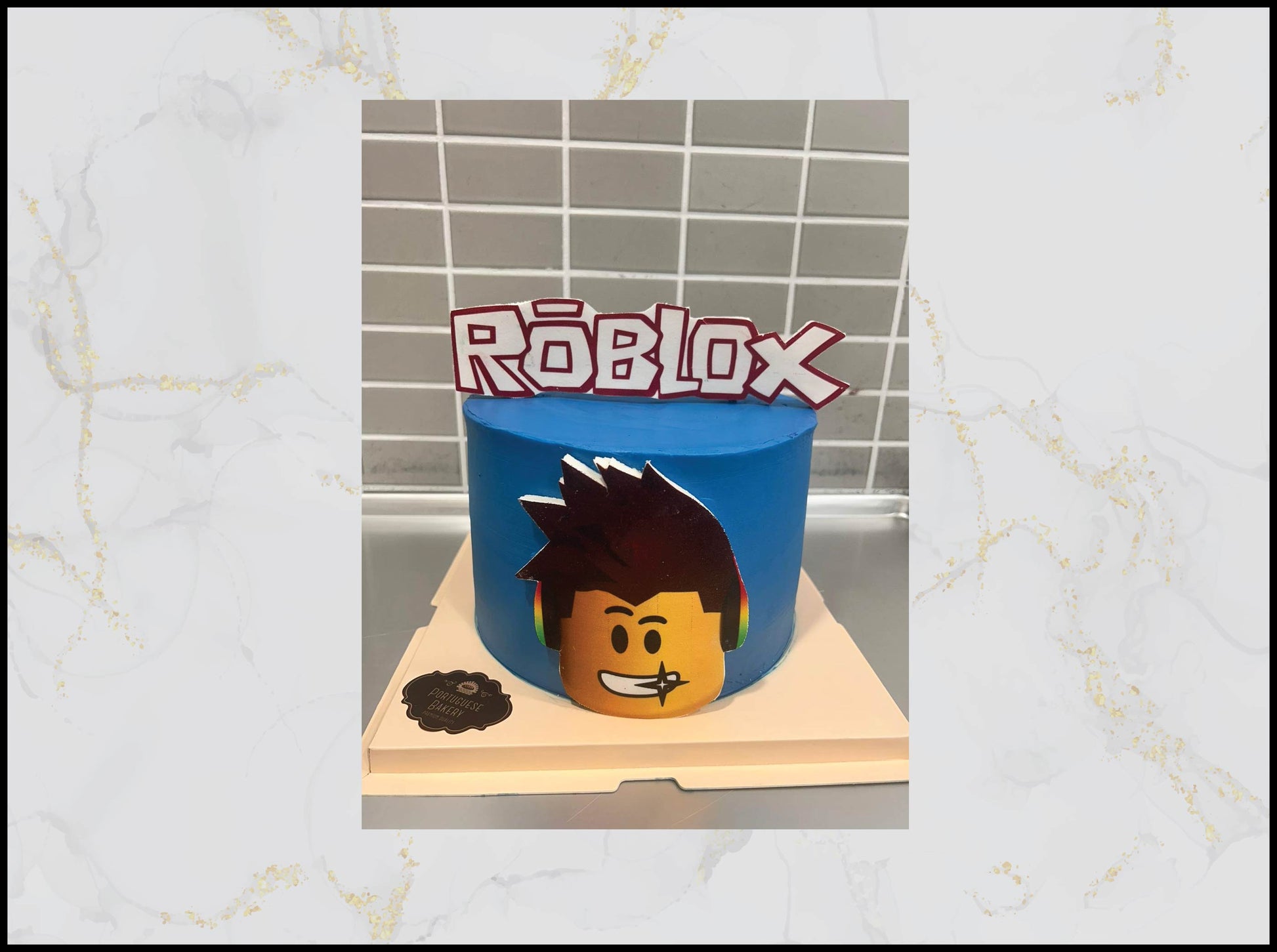 Blue cake with Roblox logo macau bakery