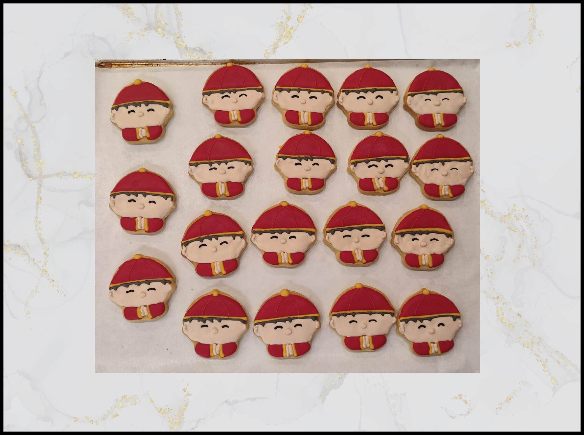 CNY boy decorated cookies with festive red and gold design in Macau