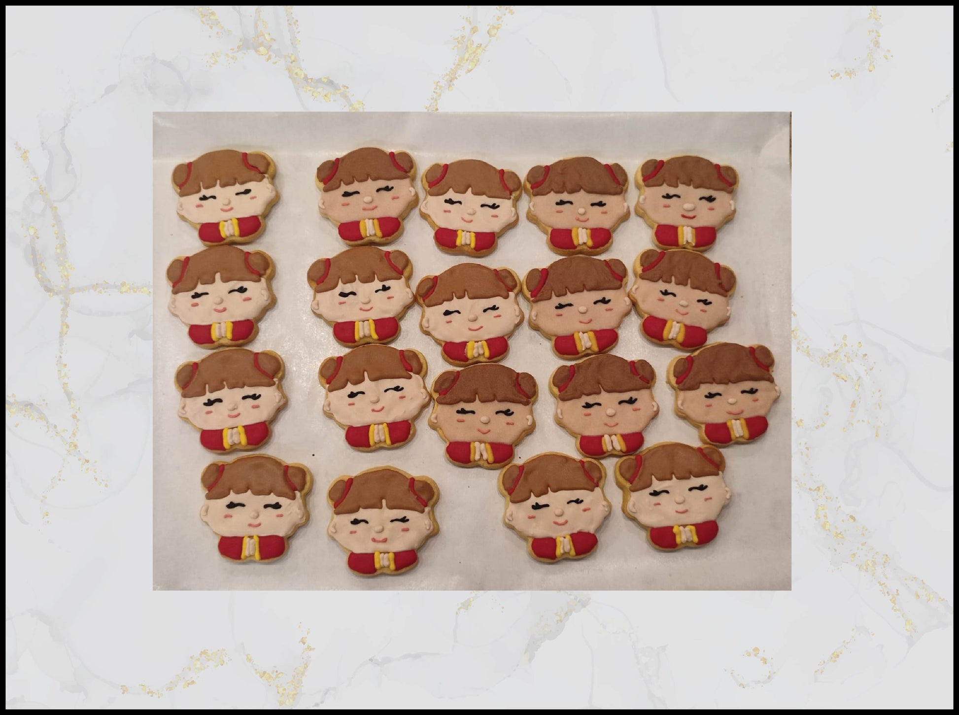 Chinese New Year girl decorated cookies with festive red and gold design in Macau