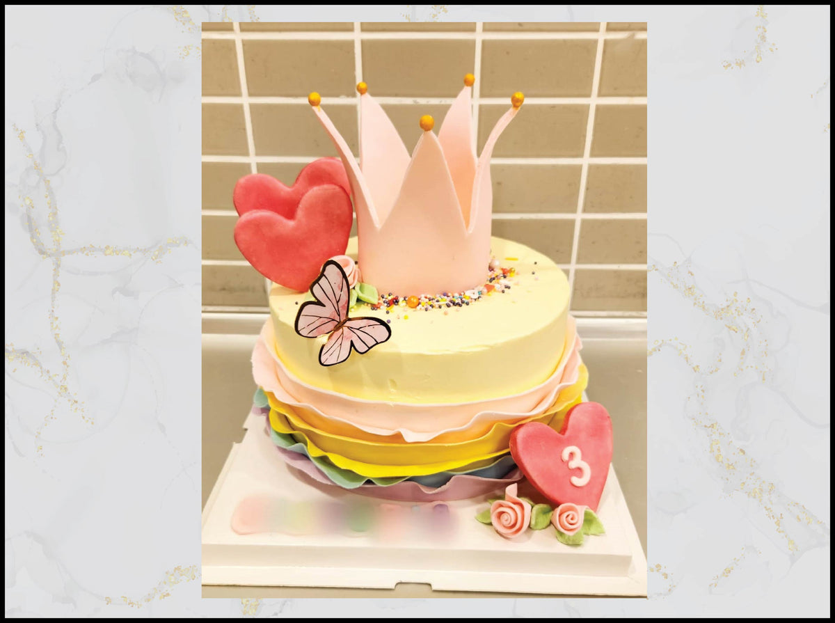 Crown and butterfly pink birthday cake with royal feminine design in Macau
