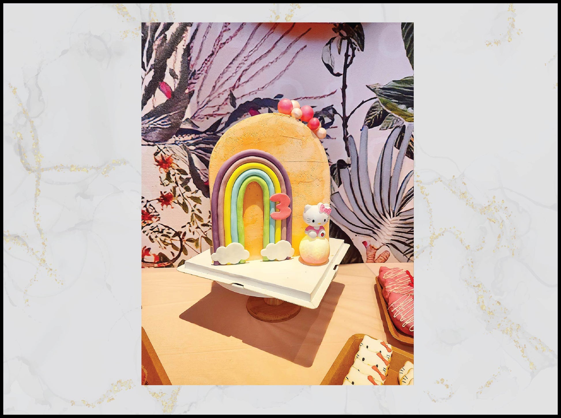 Hello Kitty rainbow birthday cake with colorful cheerful design in Macau