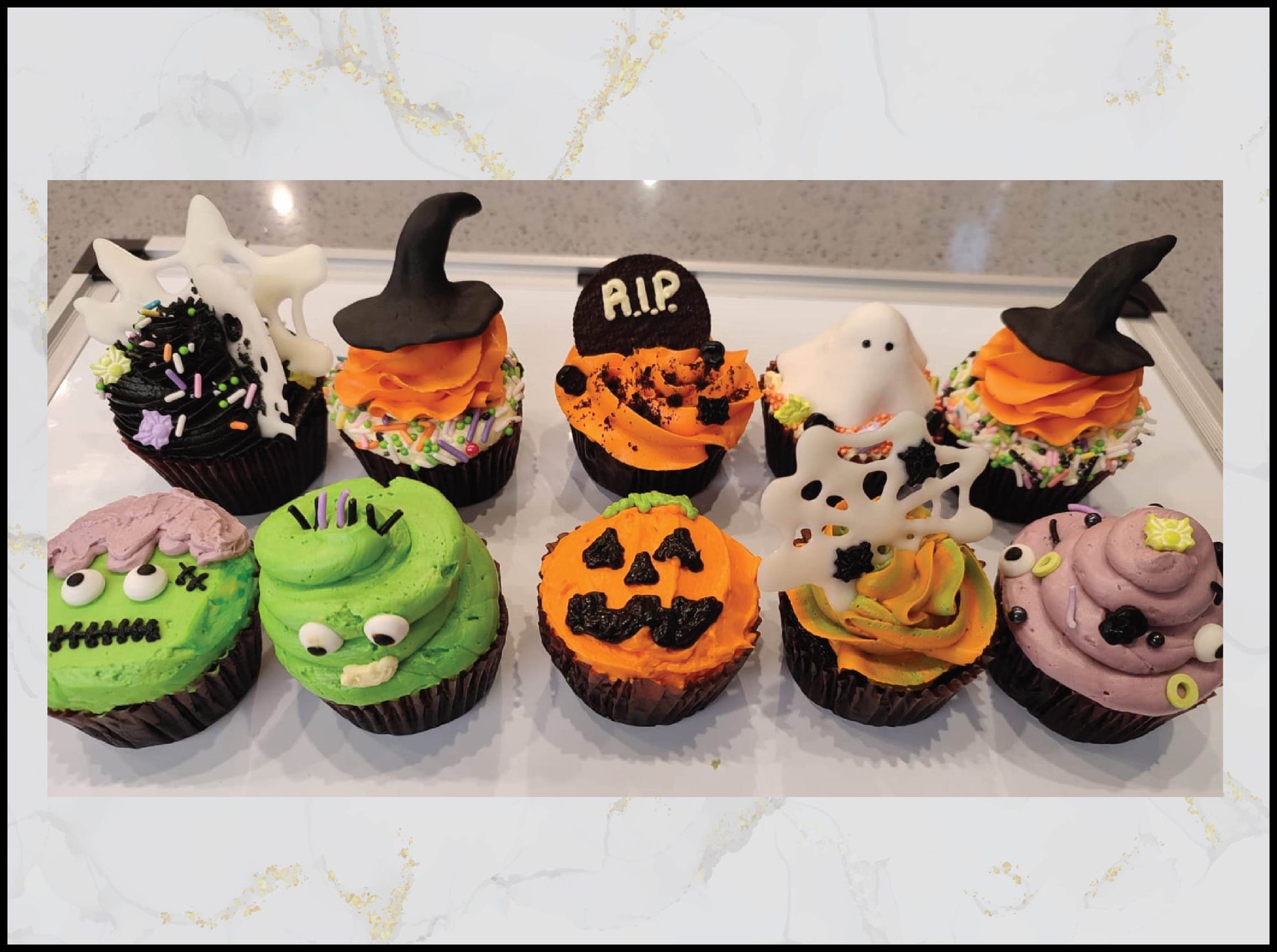 :
Mixed Halloween cupcakes with assorted spooky festive designs in Macau