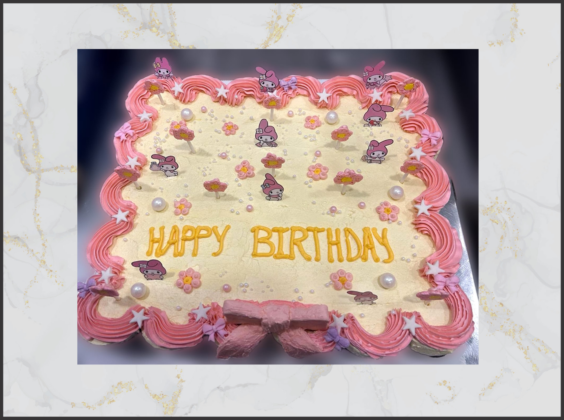 Birthday cake with pink border and 'Happy Birthday' macau cake
