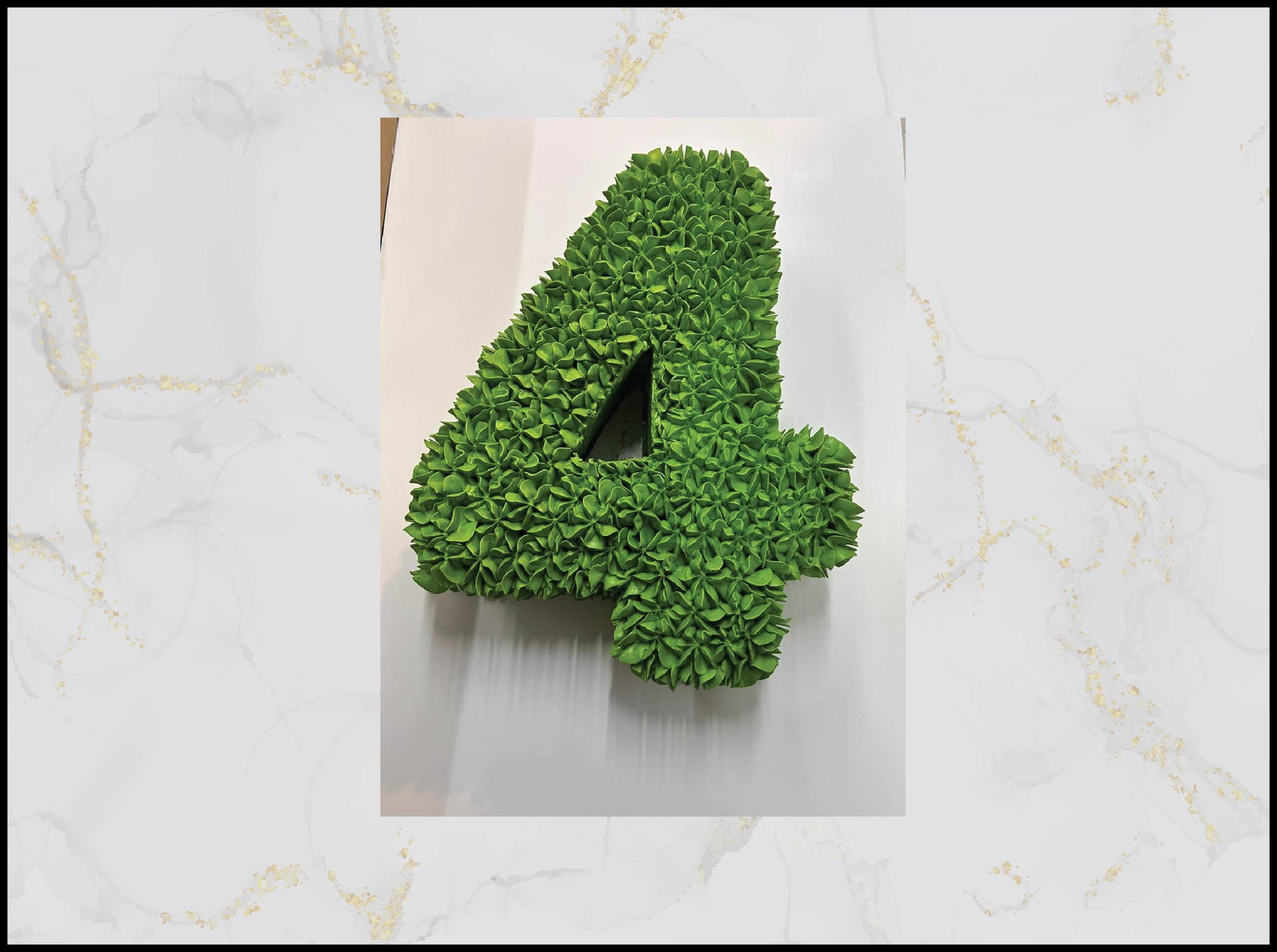 Green textured number '4' macau cake