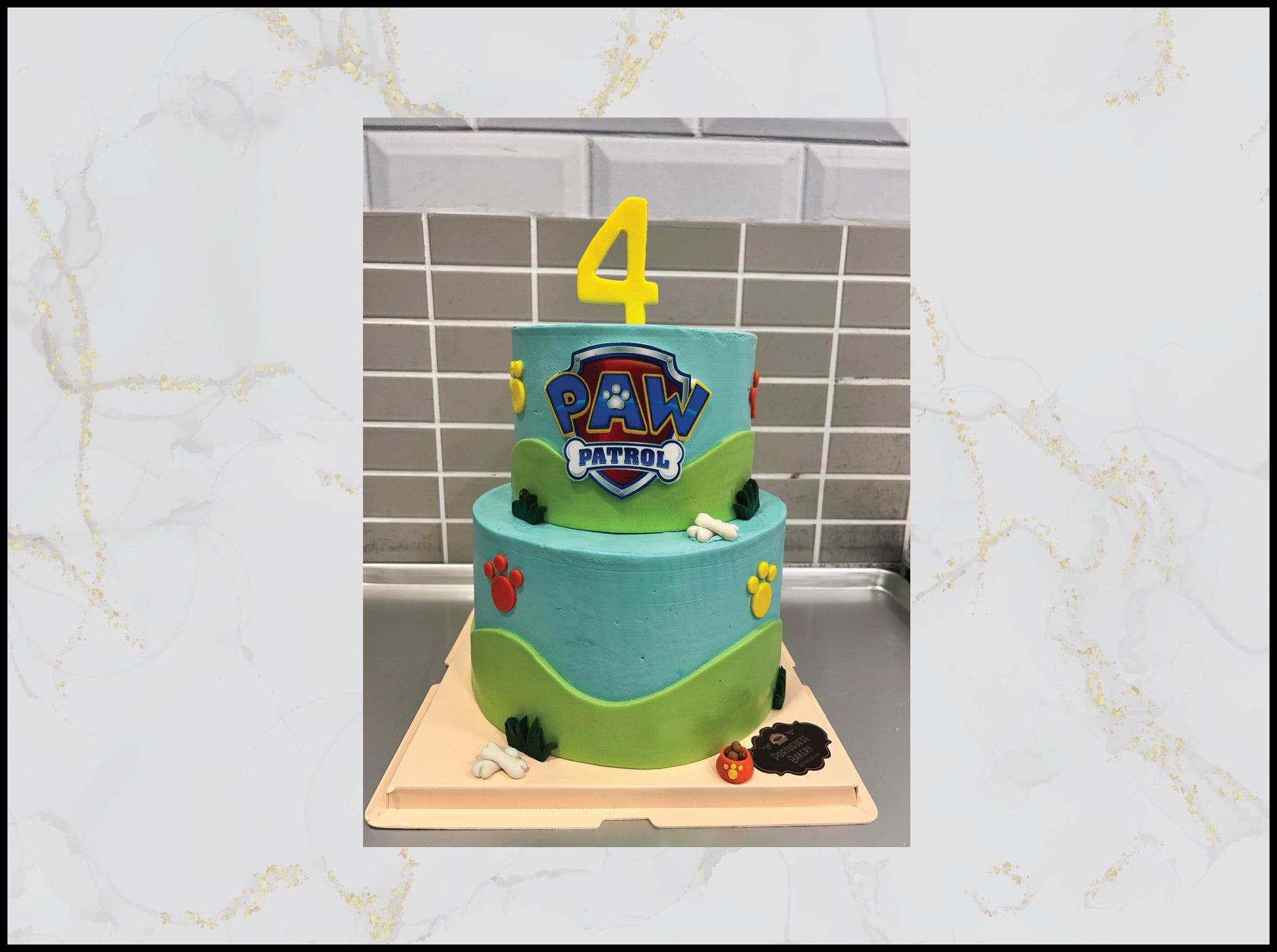 Two-tiered birthday cake with Paw Patrol theme macau bakery