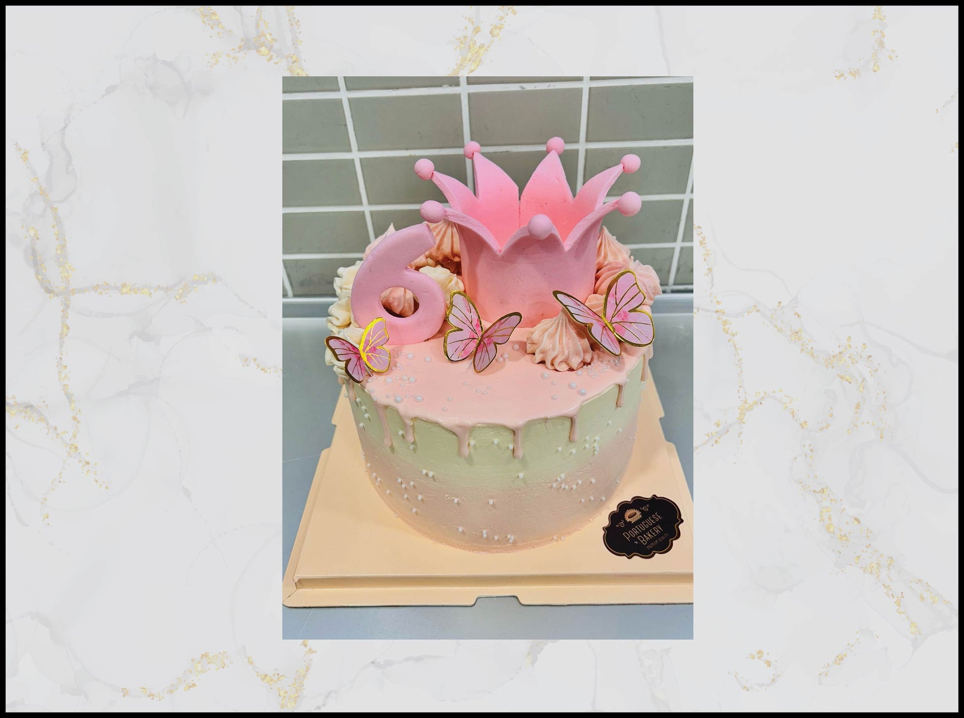 Decorative cake with pink crown and butterflies macau birthday