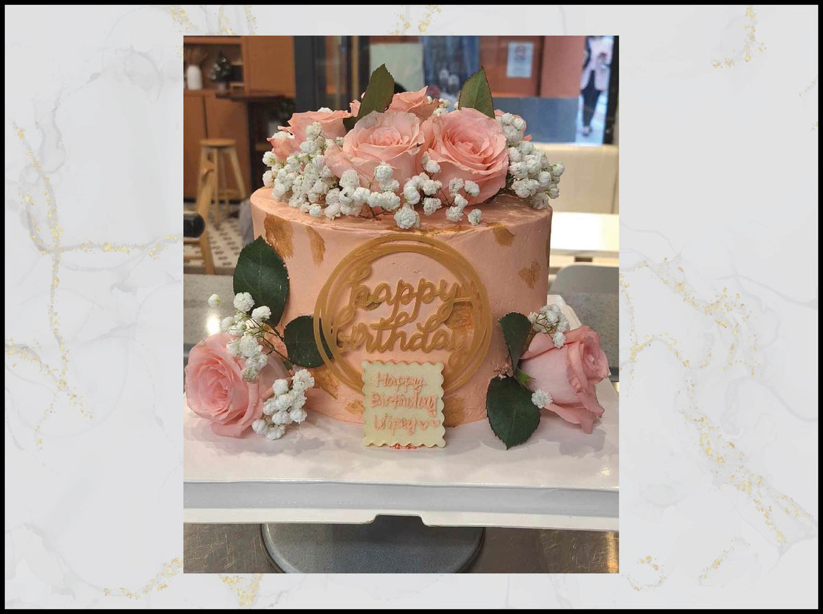 Pink and floral customized cake with elegant pastel flower design in Macau