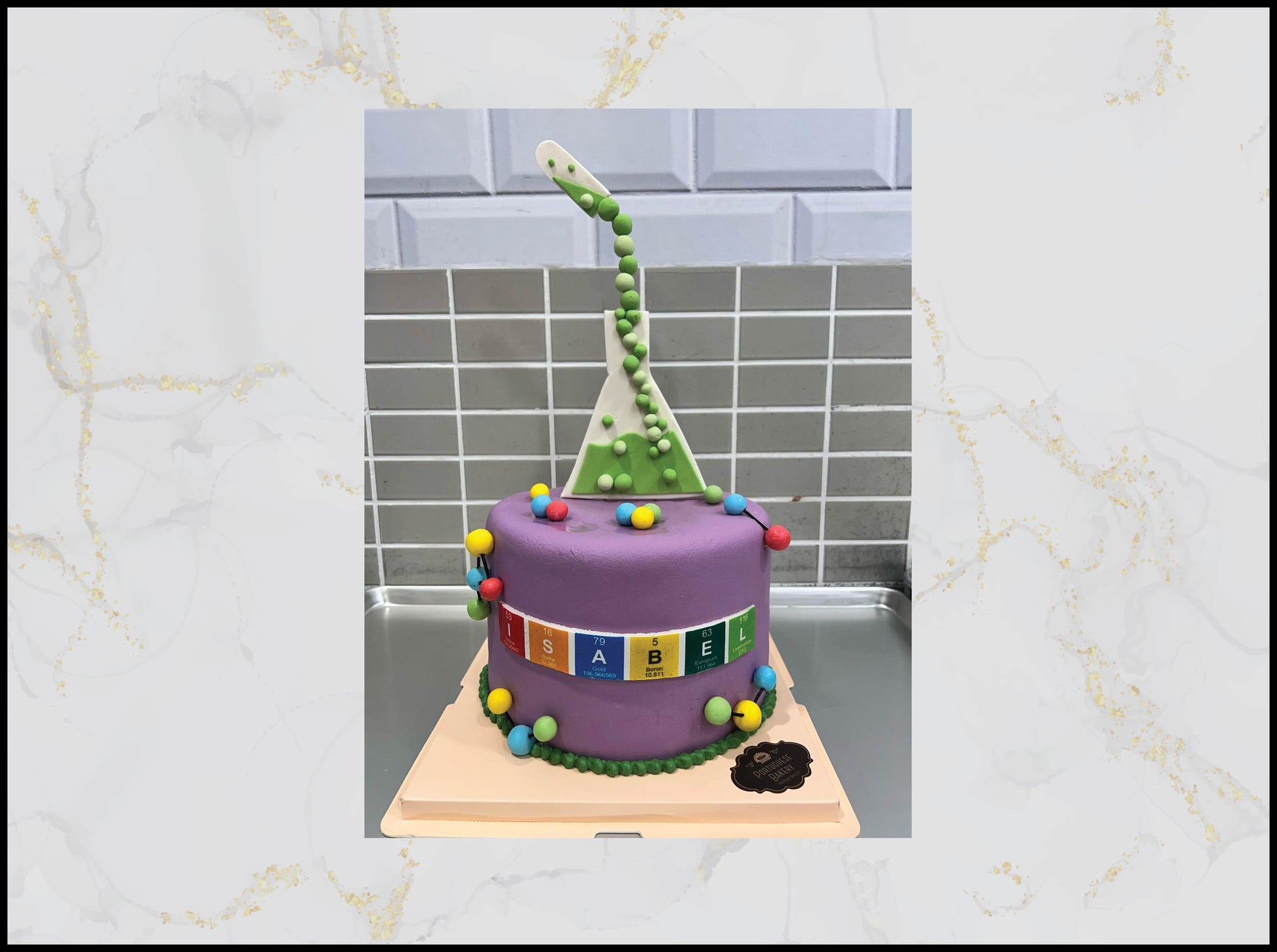 Purple cake with colorful decorations science cake macau bakery