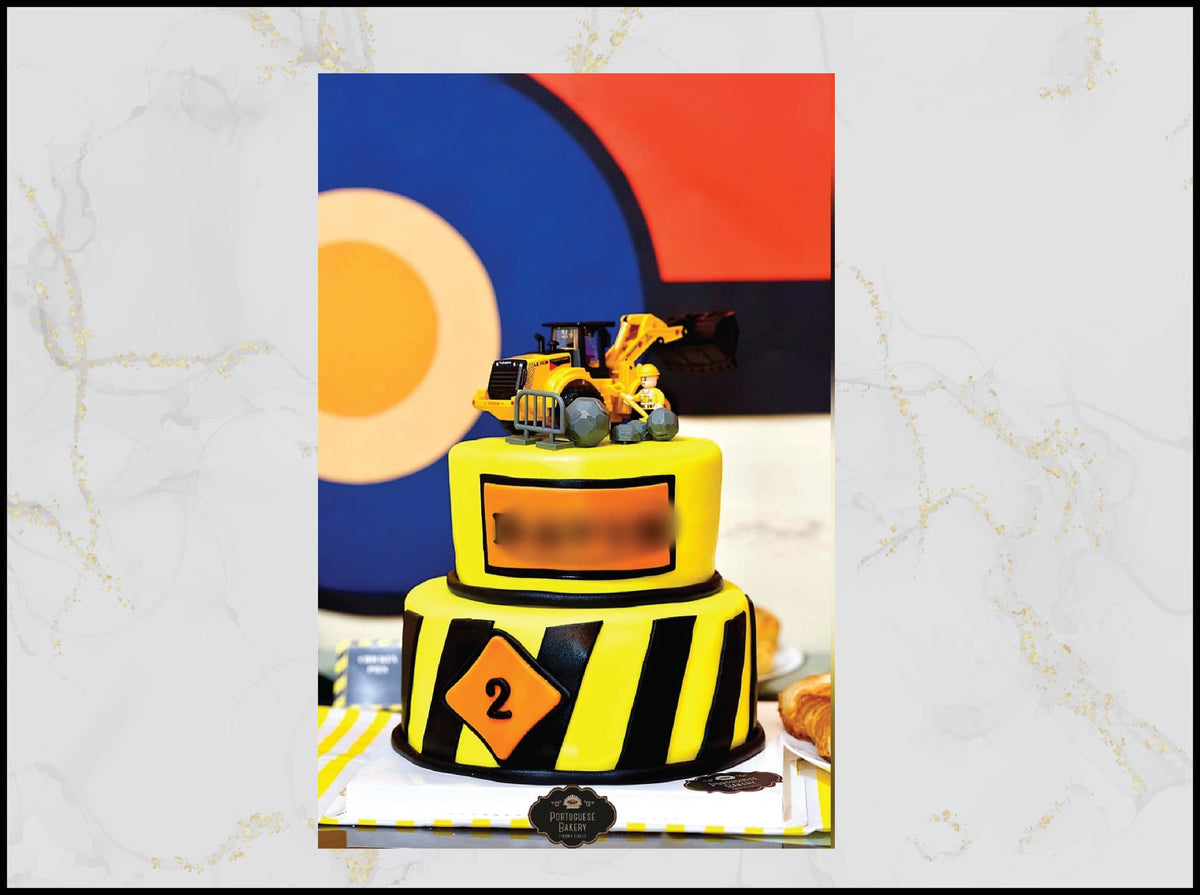 Yellow and Black Construction Birthday Cake with trucks and construction theme in Macau